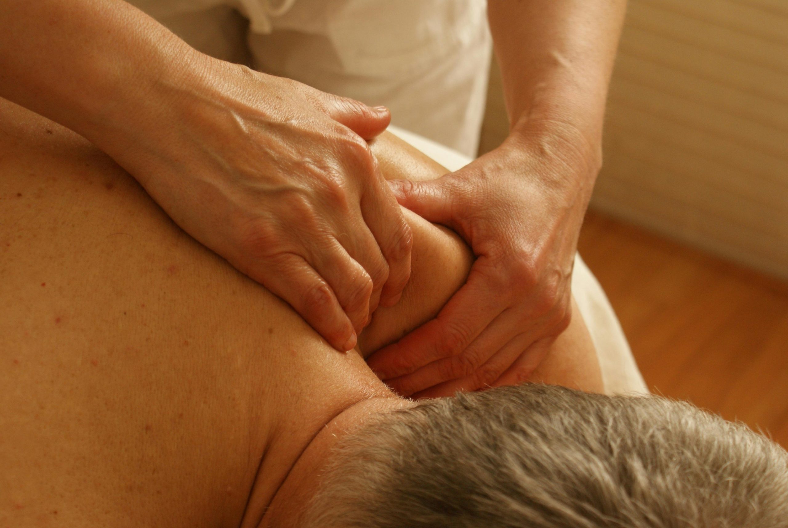 man getting a back massage